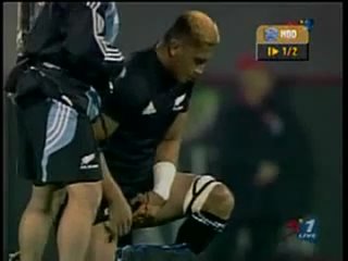 three nations rugby player field piss